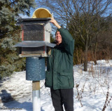 Barry filling the Backyard Garden feeder