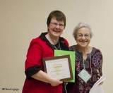 Angela Skevington receiving the Mary Stuart Education Award from Fenja