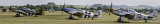 Three Mustangs wait for takeoff at Duxford