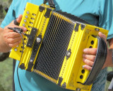 October is known for...  Outdoor Festivals - yellow accordion