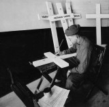 1918 - Painting names on crosses