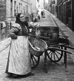 1910 - Selling fish from a barrel