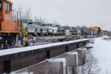 Flatcars with vehicles on the Polar Bear Express 2014 December 22nd