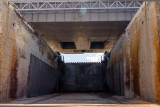 The shuttle thrust goes through the two openings into the trench.