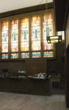 Teller windows with stained glass wall 