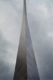 Gateway Arch disappearing into clouds