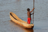 A boy in a boat on the River Manambolo