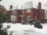 Snow shower in Glasgow in daytime