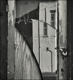 Battered Mirrored Door