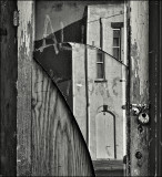Battered Mirrored Door
