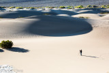 A photographer at sand dunes