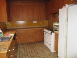 kitchen- that stove has a non-working wodburning corner
