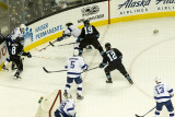Valtteri Filppula fights for the puck after losing his helmet