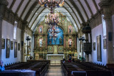 docent and altar at Mission Carmel Catholic church _Z6A0197.jpg