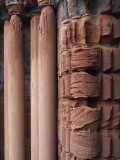Eroded stone beside cathedral doorway