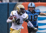 Georgia Tech DB Golden is pursued by North Carolina K Nick Weiler during a kick return