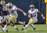 Georgia Tech A-Back Godhigh cuts off of the block from OL Will Jackson