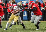 GT QB Lee attempts to break away from UGA N Mayes