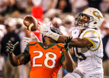 Jackets WR DeAndre Smelter attempts a catch with Miami DB Corn Elder defending