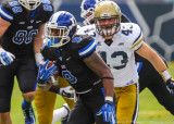 Duke RB Snead gets past the Yellow Jackets defensive front