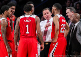NC State Wolfpack Head Coach Mark Gottfried instructs his players during a timeout