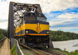 The Alaska Rail Road daily train passes over the Talkeetna River