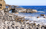 Small sea arch in Huakini Bay along the Piilani Highway	