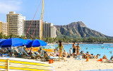 Hotels and Diamond Head in the middle of the day on Waikiki Beach