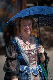 Woman with Blue Umbrella