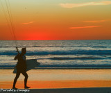 kiteboarder at sunset
