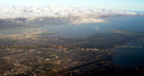 2014 - aerial view of a cloud bank over Tampa International Airport, downtown Tampa and MacDill AFB aerial stock photo #5923