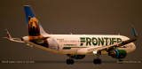 Frontier Airlines Airbus A320-214(WL)  N227FR Grizwald the Bear about to touch down on runway 9 at MIA aviation stock photo