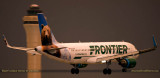 Frontier Airlines Airbus A320-214(WL) N227FR Grizwald the Bear about to touch down on runway 9 at MIA aviation stock photo
