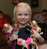 Grace with her new Barbies and accessories