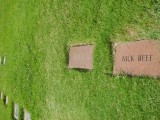 Oswalds Mother rests just the other side of Oswald in an unmarked grave