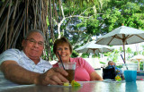 August 2010 - Don and Karen Boyd having some potent drinks at the outside bar of the military's Hale Koa Hotel on Waikiki Beach