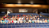 Hialeah High School Class of 1965 classmates in the new auditorium at Hialeah High School