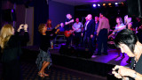HHS-66 50-Year Reunion and Reunion of the 60s:  classmates singing and dancing on stage with the band