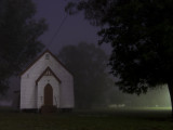 Church by moonlight and fog