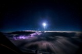 Thunderstorms over Kyrgyzstan with a full moon