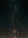 A bright Perseid traveling the Milky Way