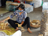 A woman working in the main market - Hanoi, Vietnam (see next photo)