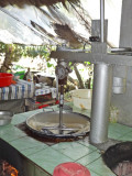 Making coconut candy - on an island near My Tho in the Mekong Delta, Vietnam