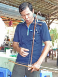 A musician at our tea party - on an island near My Tho in the Mekong Delta, Vietnam