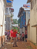 Fran and Alan on a street near the room of several of our sponsored young ladies (college students) - Phnom Penh, Cambodia