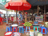 A service plaza with little else around it - a few hours outside of Phnom Penh, Cambodia while our group was traveling in SUVs