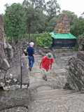 Sally, Stan and Alan exploring the 9th century c.e. Bakong Temple - part of the Roluos Group, Cambodia.