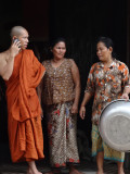 Hindu monk & women in a small village near the Roluos Group of temples & monuments