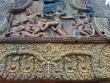 Bas reliefs: Upper: Combat between Vali and Sugriva. Lower: Finely detailed carving of an unidentified Hindu god - Banteay Srei
