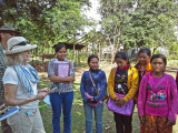  Left to right: Helen, Alan and Sitha with some of our sponsored young ladies (high school students)
